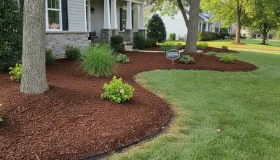 Freshly installed mulch beds with clean edges and rich color by Chop Chop Landscaping in Louisville, KY